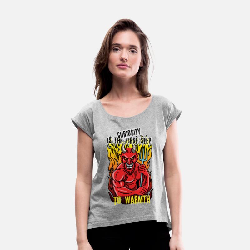 Smiling devil with a pitchfork standing on fire